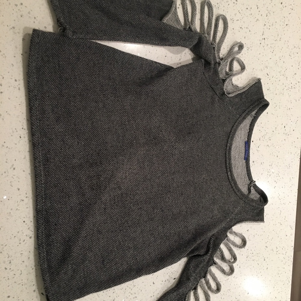 Cut out grey sweatshirt.